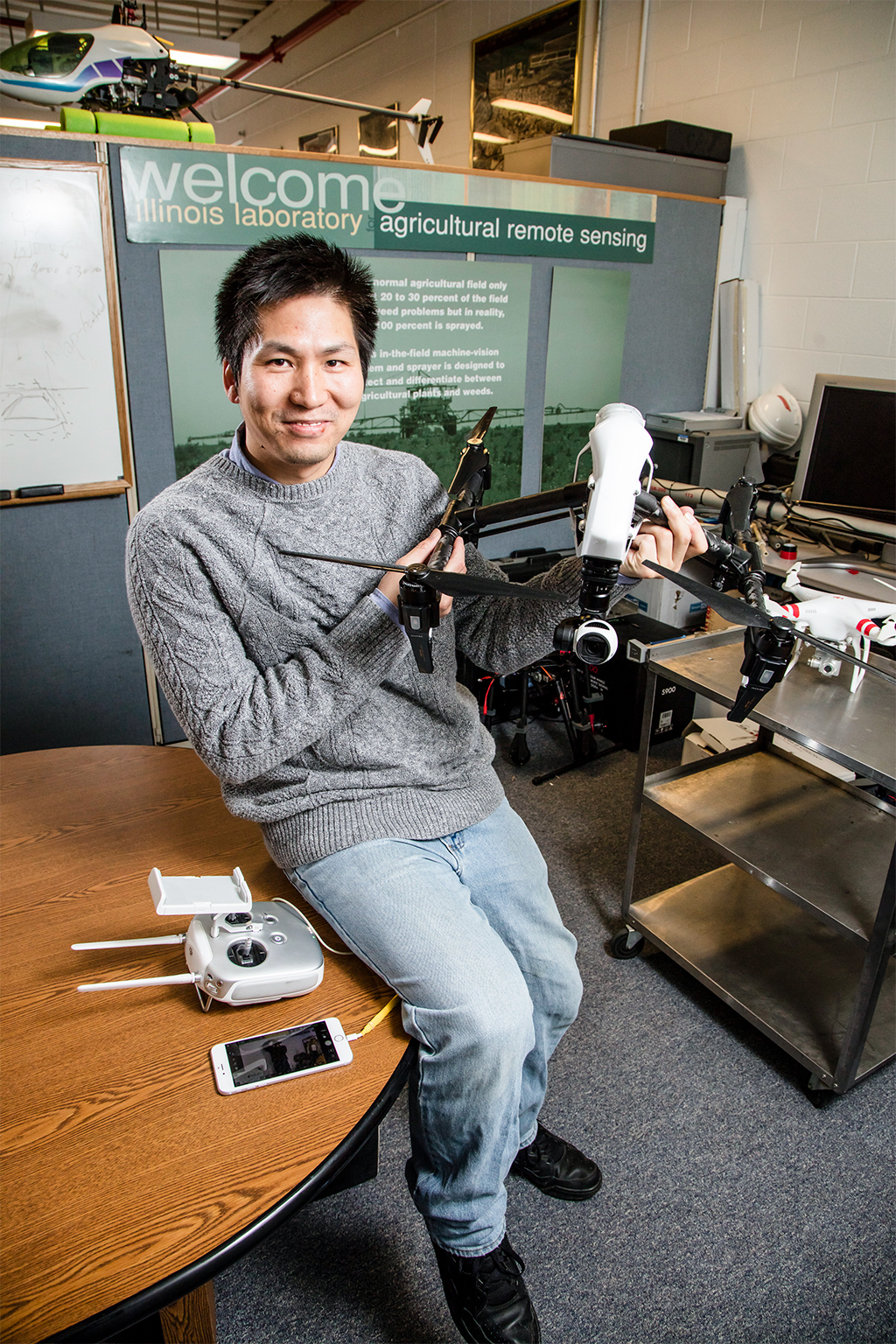 Student showing off an agricultural drone.
