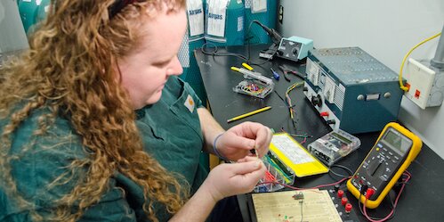 Student working with wiring