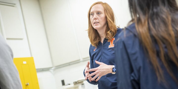 Faculty member engaging with graduate students