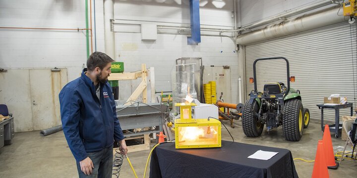 Staff member facilitating controlled explosion