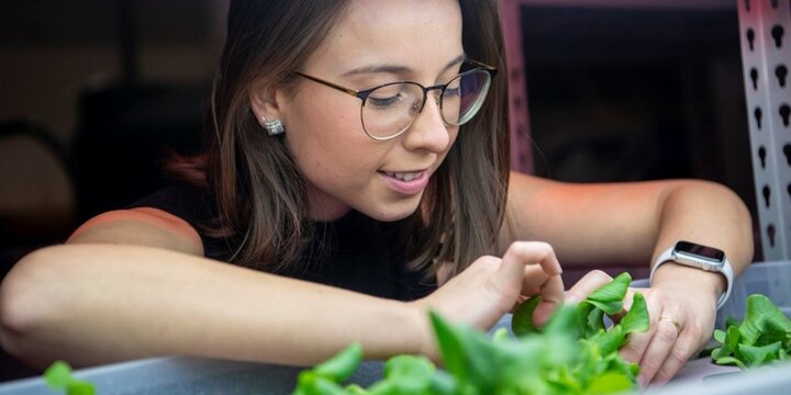 Student examining soil.