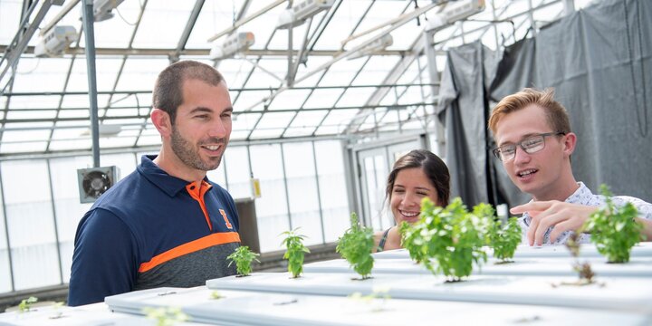 Students in greenhouse.